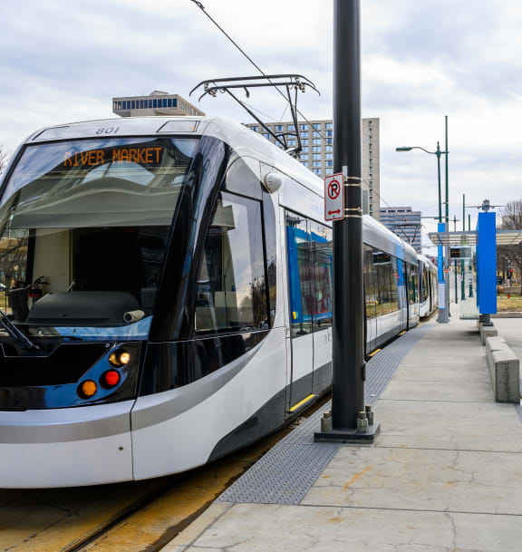 a light rail train at a station
