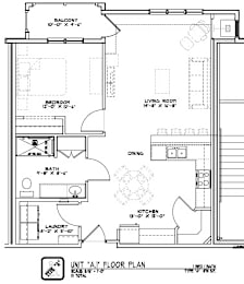 A floor plan of a house with a kitchen, living room, and two bedrooms.