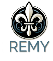 The logo for The Remy Apartments features a stylized fleur-de-lis design.