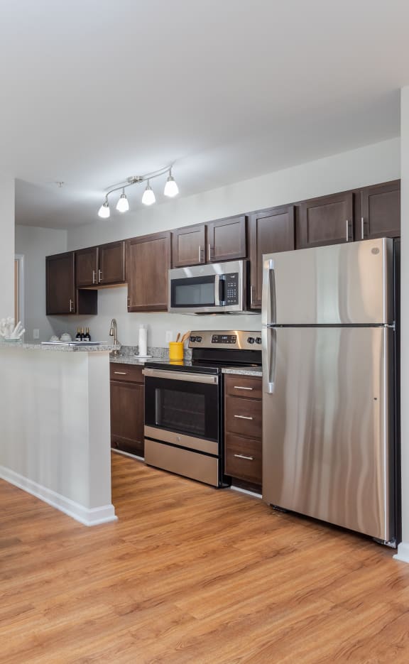 a kitchen and dining area in Oasis at Cedar Branch