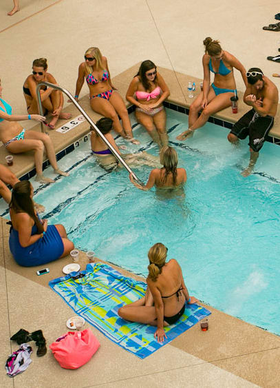 young adults enjoying the pool  at Greenway at Stadium Park, Greensboro