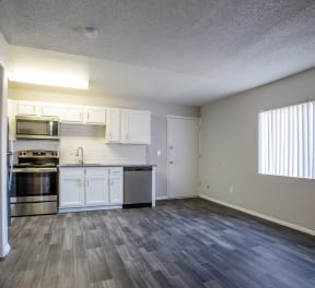 Living Room and Kitchen Area at The Link at 4th Ave Apartments