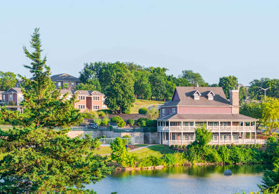 a view of a building overlooking a body of water
