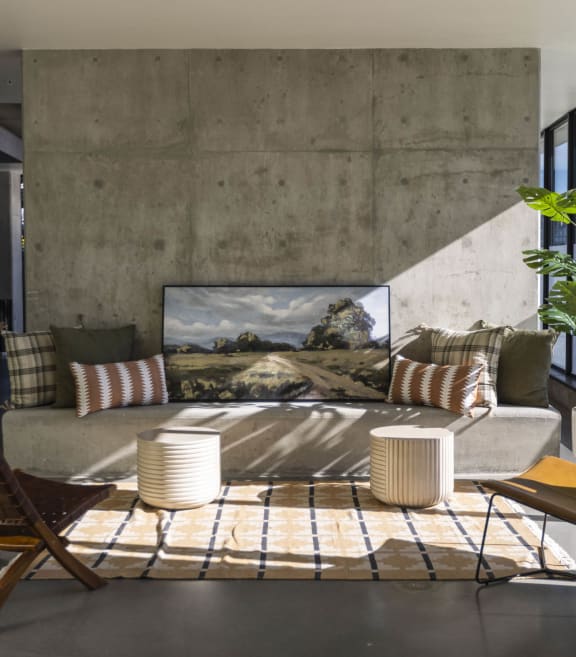 a living room with a couch and chairs and a large window at Moraine, Tacoma, Washington