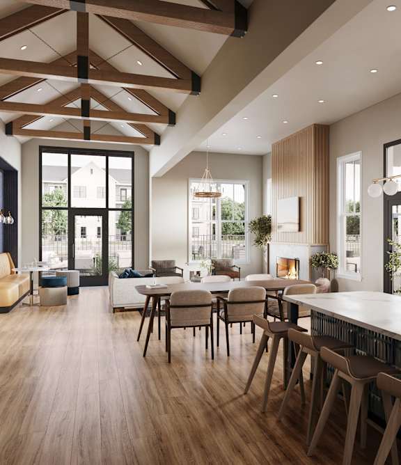 Open concept kitchen and dining area with vaulted ceilings at Wildwood Lakeville Apartments, Lakeville