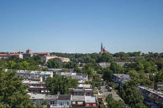 a city filled with lots of buildings and trees