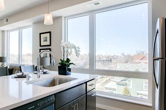 View of apartment from kitchen island at The Central apartments near downtown Minneapolis MN 55408