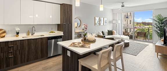 A modern kitchen with a dining table and chairs.