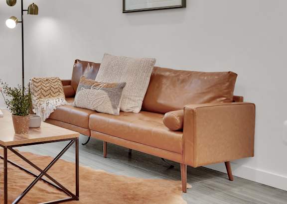 a living room with two couches and a coffee table