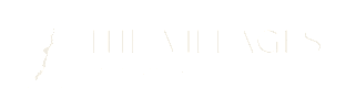 A logo with a white outline of a map of New Zealand and the words at The Villages at Saugatuck, Westport, CT