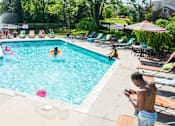Thumbnail 15 of 20 - Pool at Arbor Glen Apartments in East Lansing, MI near Michigan State University.