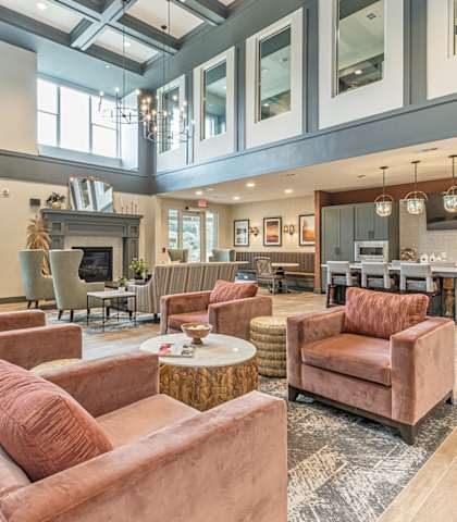 A living room with a fireplace and a couch.