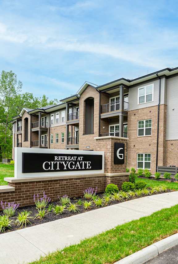 a rendering of a cityite building with trees in front of it