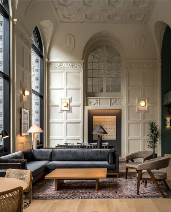 a rendering of a living room with couches and a fireplace
