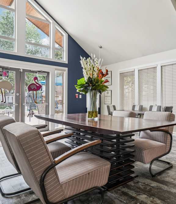 A modern dining room with a large table and chairs at Glen at Lakewood, Lakewood, 80228
