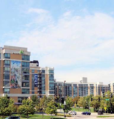 a view of a city with buildings and trees
