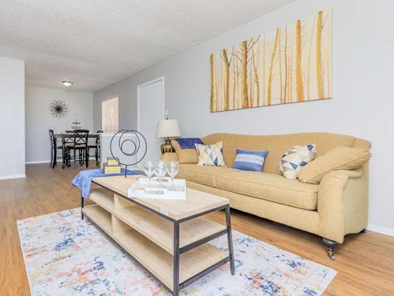 a living room with a couch and a table