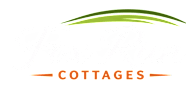 The image is a logo for "Fox Run Cottages" with stylized text and a green fox tail.