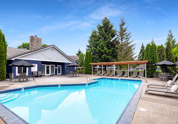 Outdoor swimming pool and tanning deck at Valley River Court in Eugene
