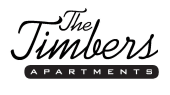 a logo of the timbers apartments typography