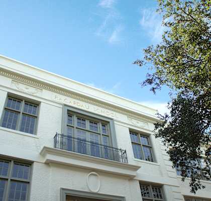 A white building with the words "Cadbury School" on the side.