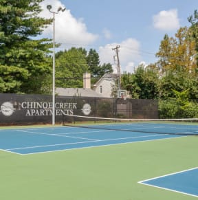 the tennis courts at Chinoe Creek Apartments in Lexington KY