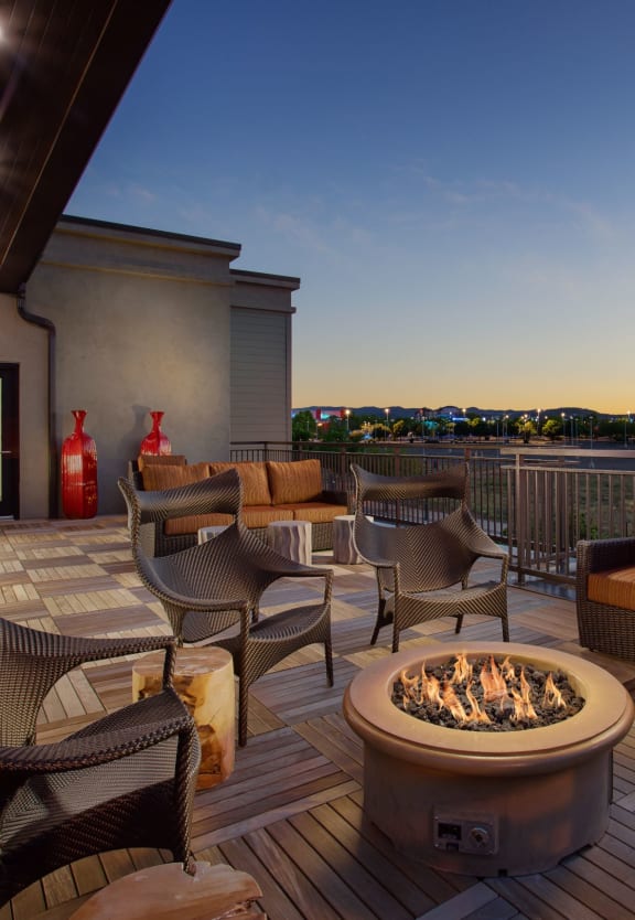 a deck with furniture and a fire pitat Homestead Talking Glass, Prescott Valley, AZ 86314