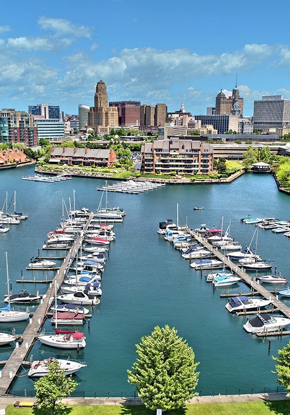 a marina with a city in the background at The Granite Works Apartments , Buffalo, 14202
