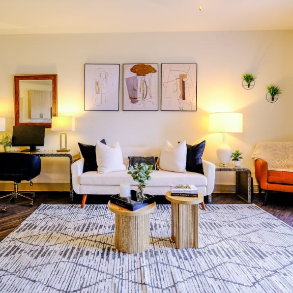 a living room with a couch and a table