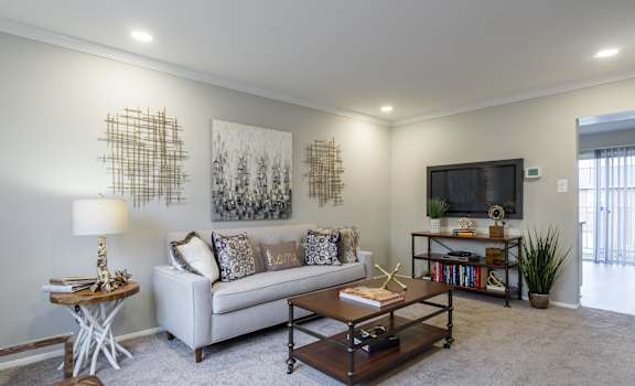 a living room with a couch and a coffee table