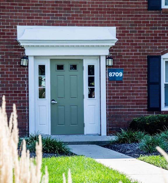 Front door in brick building at Barrington Estates Apartments, Indianapolis