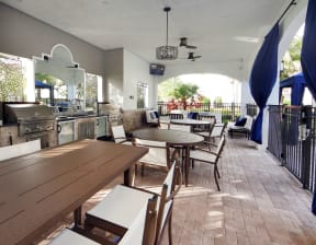 Poolside lounge with barbecue grills | Barcelona Jupiter