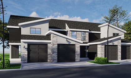 A modern house with a black roof and a large front yard.