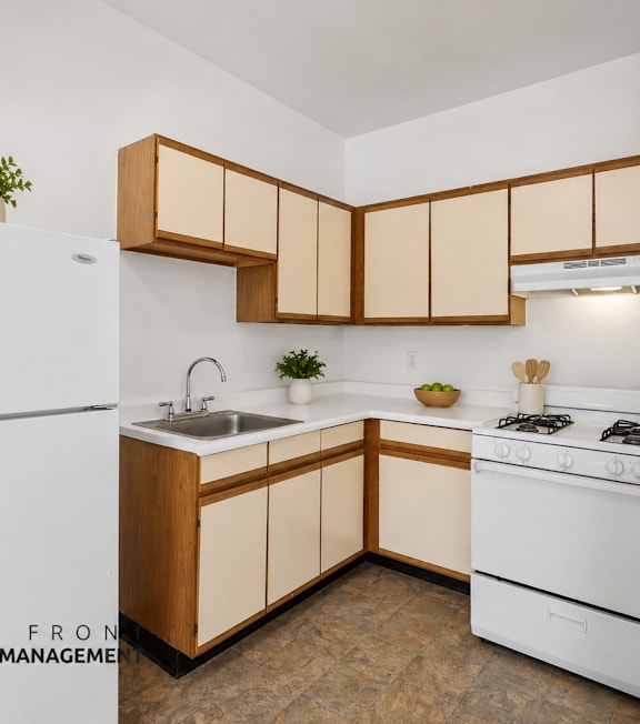 A well-lit, modern kitchen and living room with a dining area.