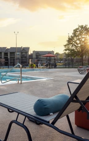 our apartments have a swimming pool and a patio with furniture