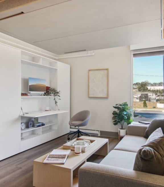a living room with a couch and a coffee table