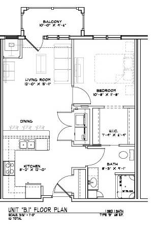 A floor plan of a house with a kitchen, living room, and two bedrooms.