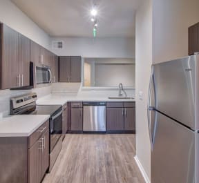 Kitchen with Stainless Steel Appliances | Stonelake at the Arboretum