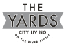 a logo for the yards city living on the river blues