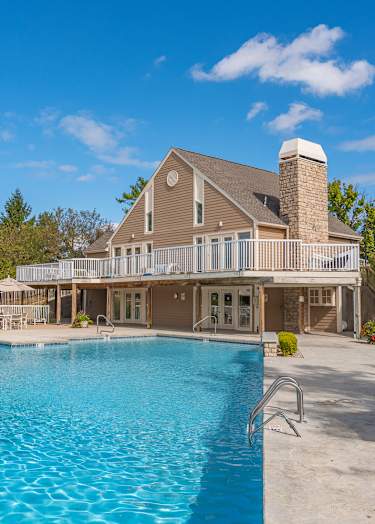 our apartments showcase an outdoor swimming pool at Enclave, Beavercreek, Ohio