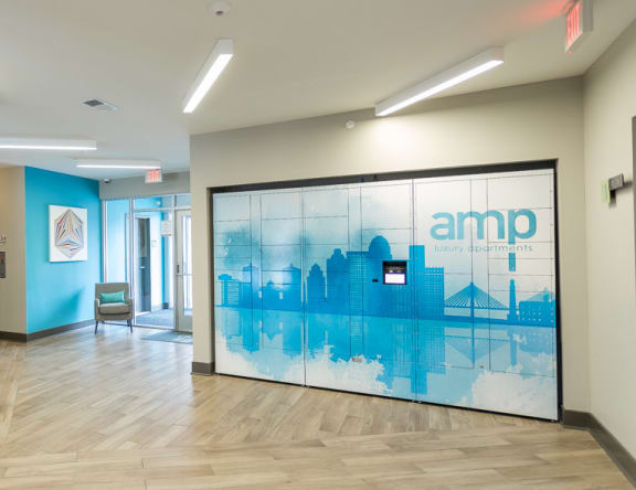 Lobby area with seating at AMP Apartments, PRG Real Estate, Kentucky