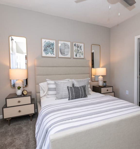 a bedroom with a large bed and a closet at Willowest in Collier Hills in Atlanta, Georgia 30318
