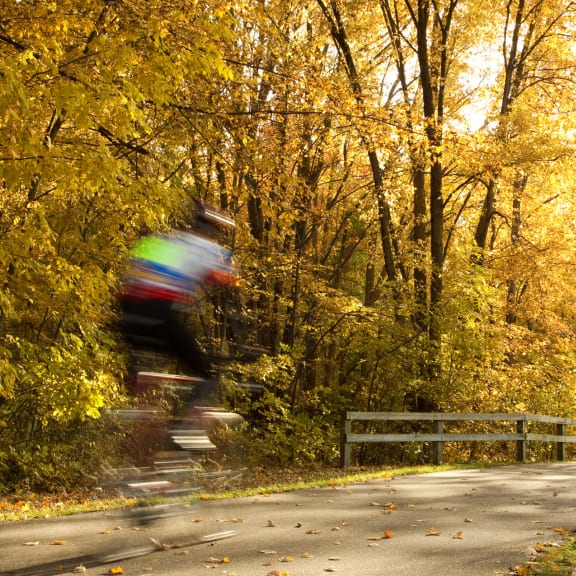 person riding a bike on path at Clearwater, Post Falls, ID 83854