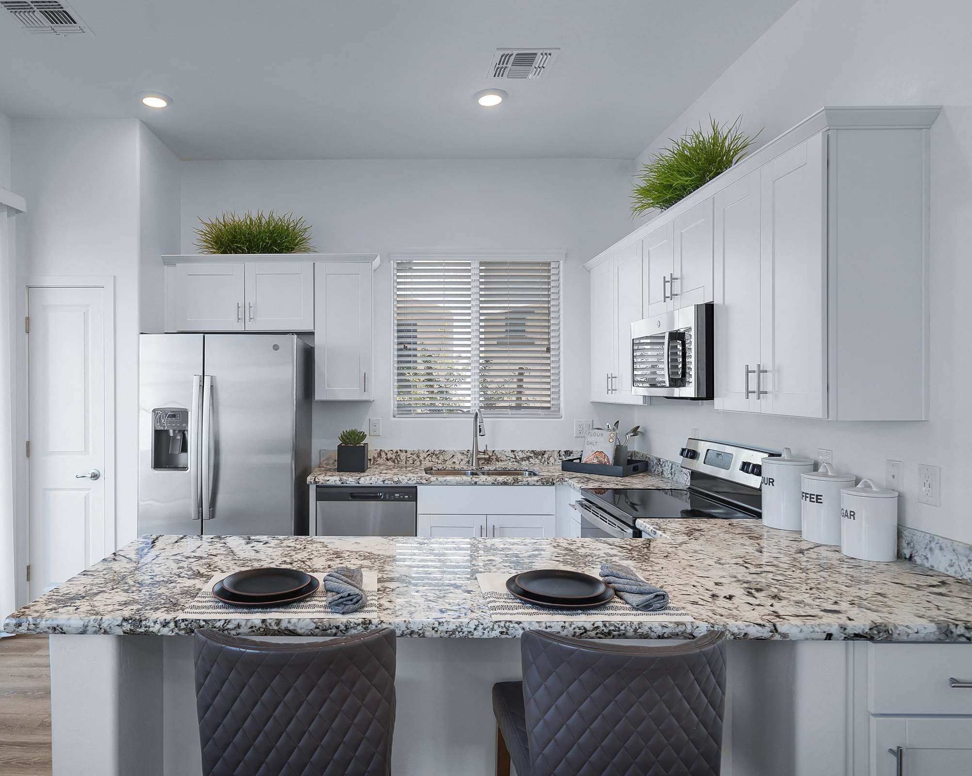 Apartment kitchen — representative home at Avilla Magnolia.