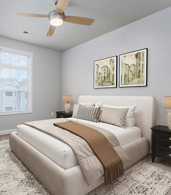 Bedroom with ceiling fan at The Reserve at Mayfaire Apartments, North Carolina, 28405
