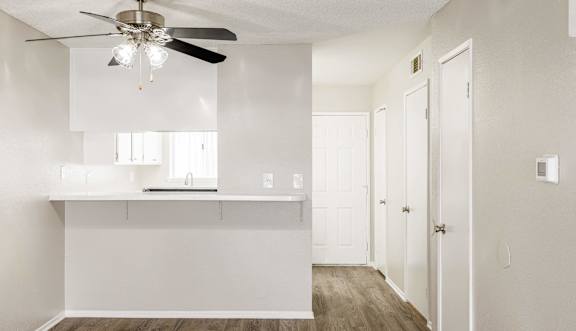 a kitchen and dining area in a 555 waverly unit