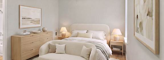 bedroom with cabinets and a couch