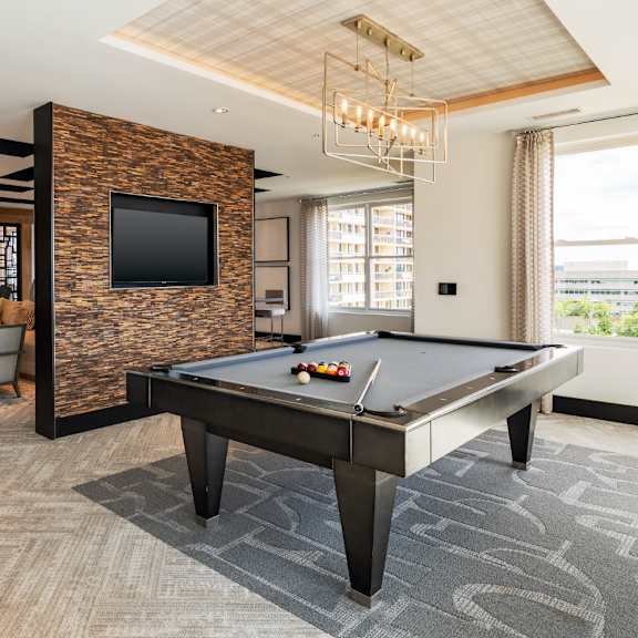 a billiards table in a lobby of a building