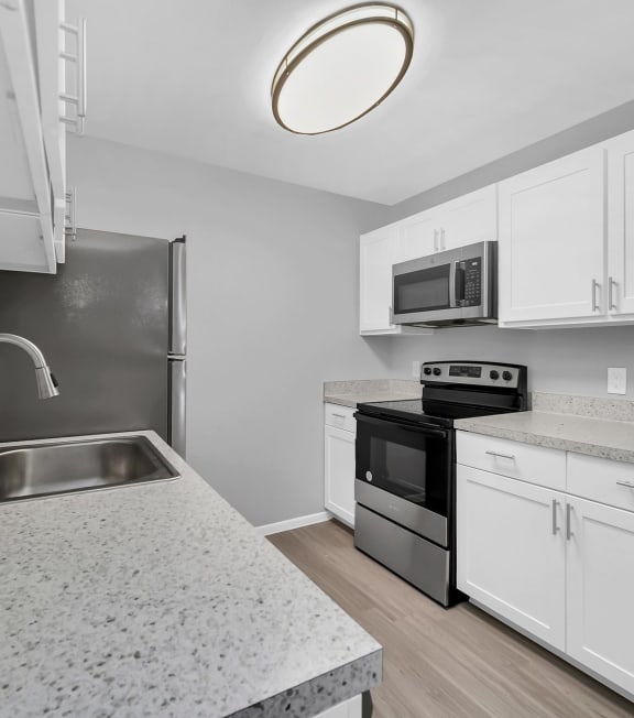 Newly renovated apartment kitchen at Southern Oaks Residences in Orlando, FL