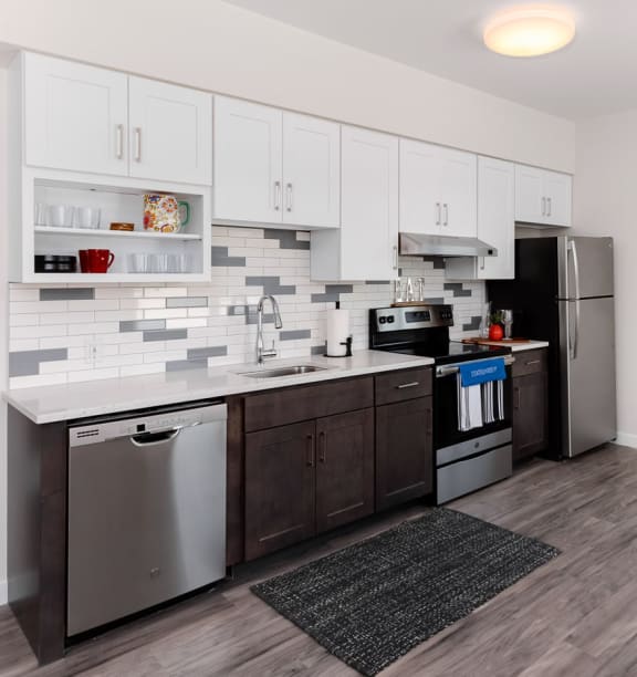 Studio Apartment Kitchen with two tone cabinets